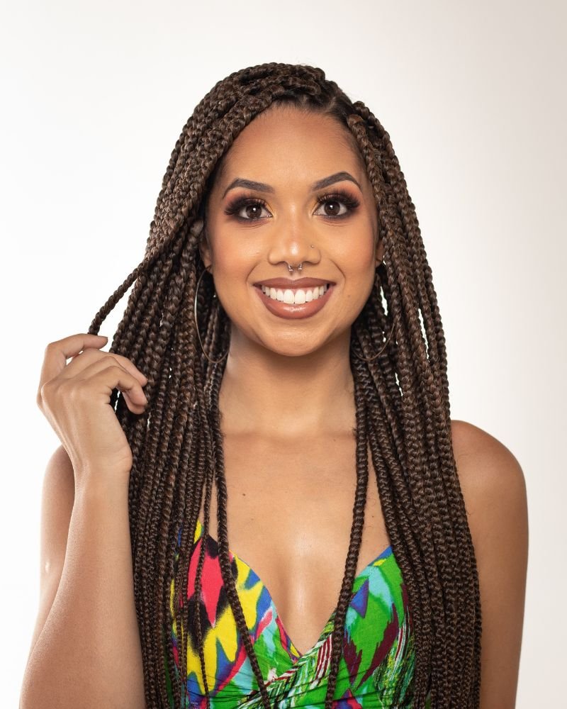 woman with braids wearing protective hairstyle