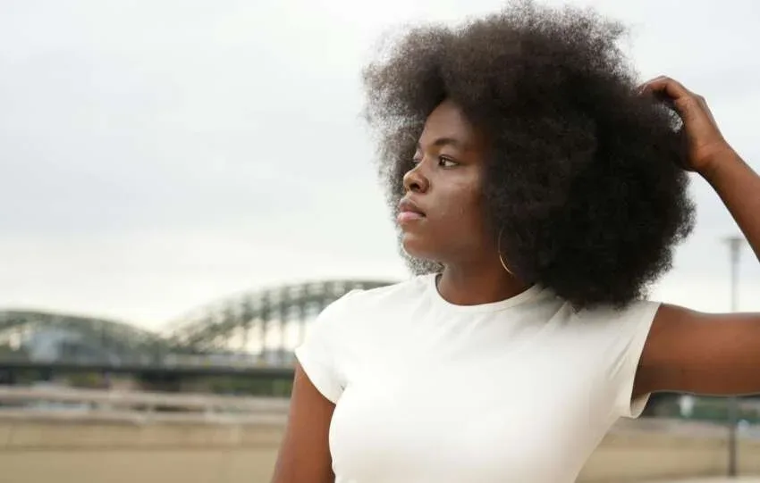 fine natural hair type 4 texture afro outdoors