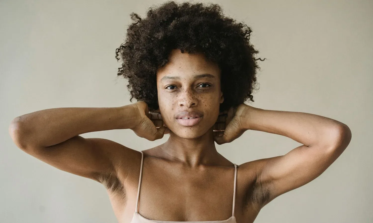 Natural 4C hair texture on Black woman with defined coils and healthy strands