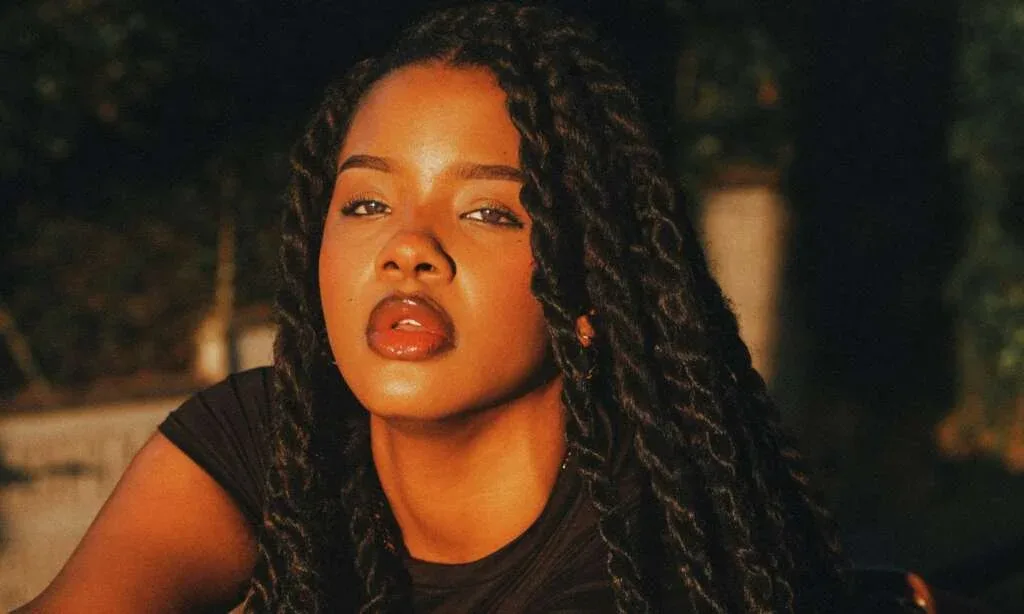 Woman wearing a low manipulation twist hairstyle for fine natural hair